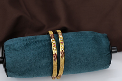 gold finish Oval design Bangles