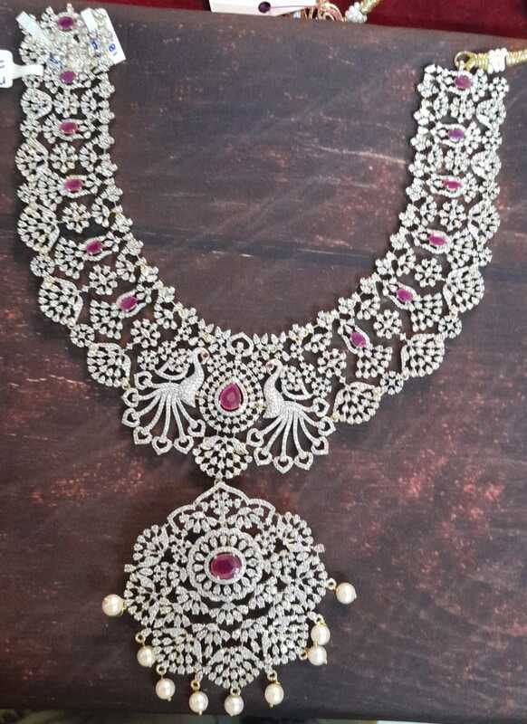 Peacock with pink stone haram