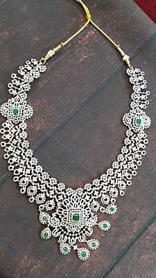 Little flower design with green stone