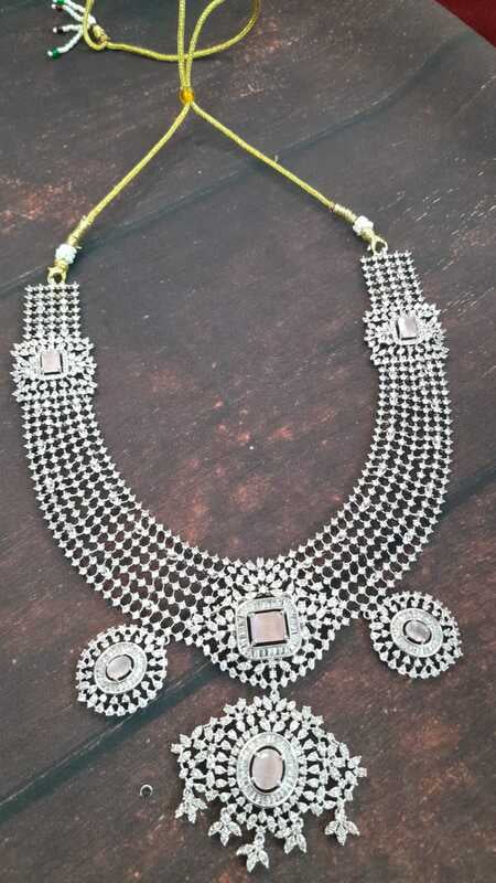 Neat white stone haram with lite punk stone Neat white stone haram with lite punk stone