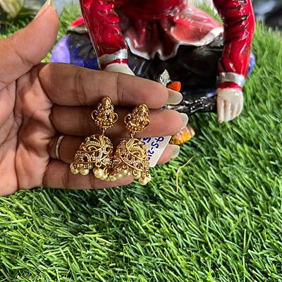 Temple Design AD Stone Studded Lakshmi Jhumka Earrings with Pearl drops