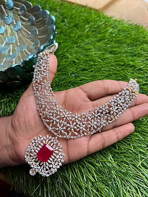 gold finish diamond replica neckpiece with Ruby Pendant