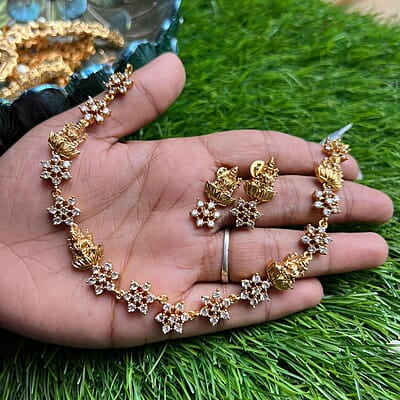 Gold finish Lakshmi designed AD flower design Neckpiece with Earing