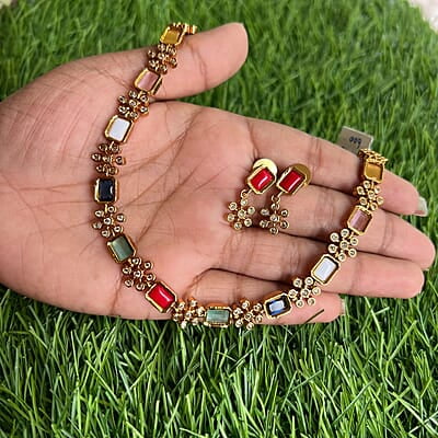 Gold Finish multi stone flower neck peace