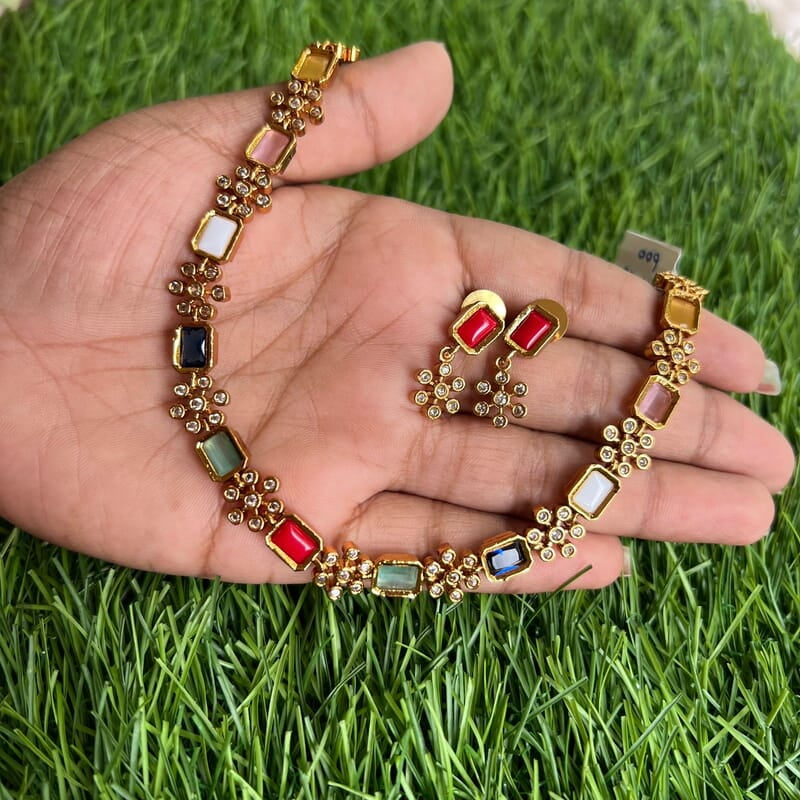 Gold Finish multi stone flower neck peace Gold Finish multi stone flower neck peace