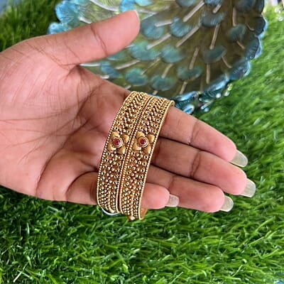 Unique design traditional pattern gold finish bangle - Broad