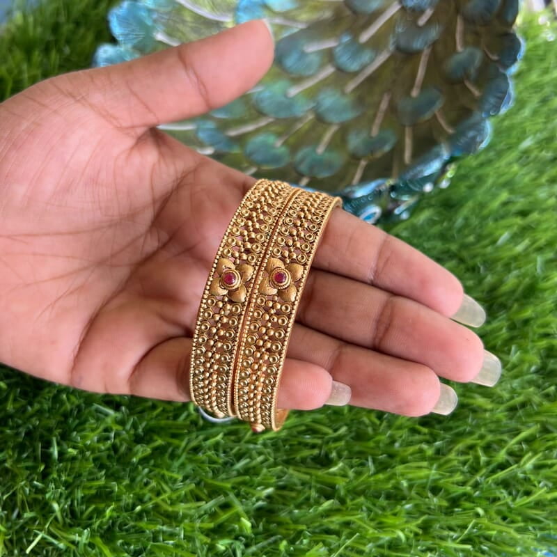 Unique design traditional pattern gold finish bangle - Broad