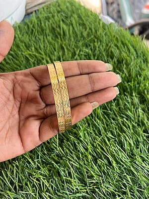 Gold finish unique regular use Bangles
