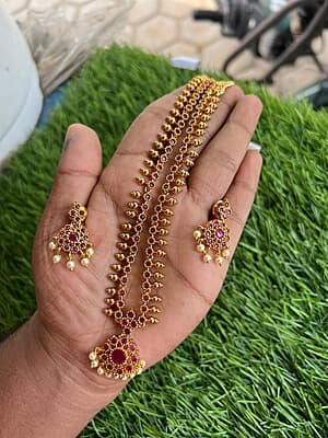 Circle design with unique stone and pearl longharam