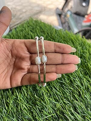 Silver finish with square pearl stone bangle