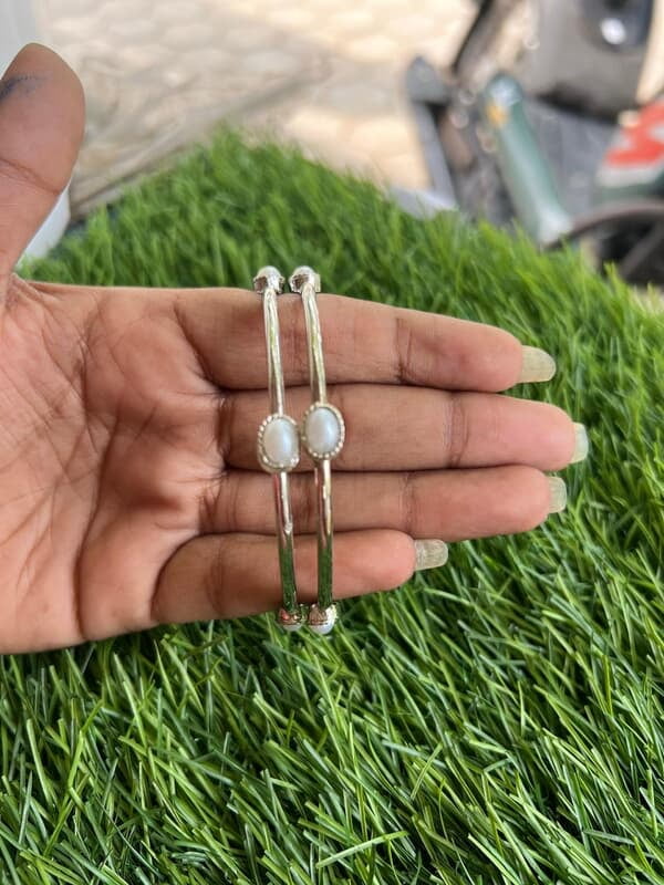 Silver finish with square pearl stone bangle Silver finish with square pearl stone bangle