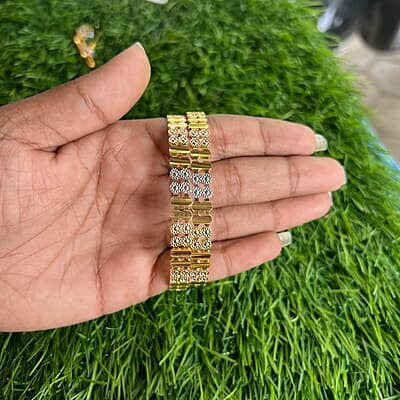 Fashionable flora design gold finish bangle