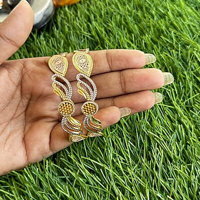 Eye design with unique design gold finish bangle