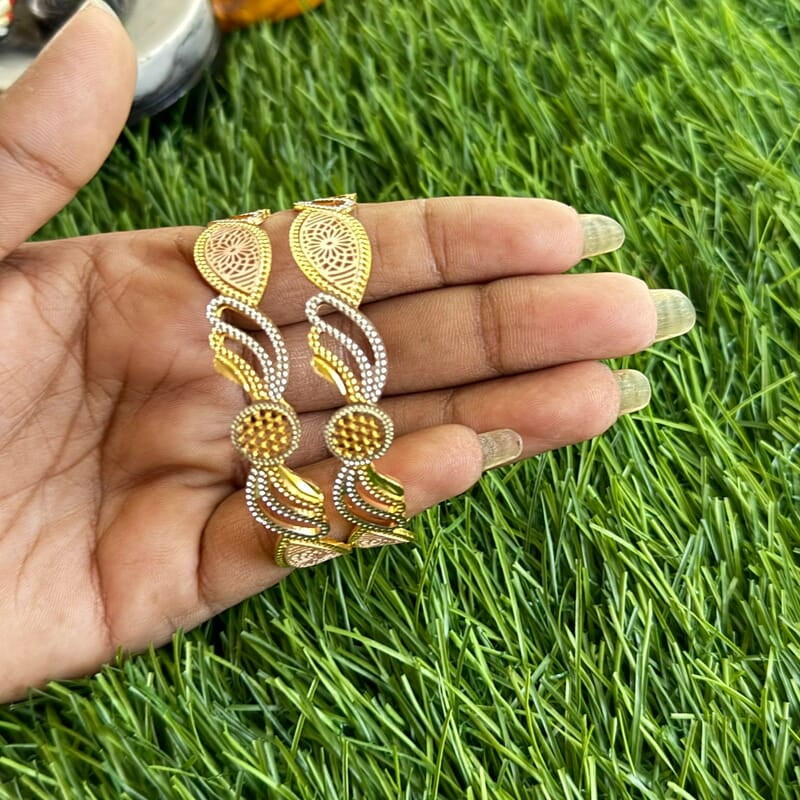 Eye design with unique design gold finish bangle Eye design with unique design gold finish bangle