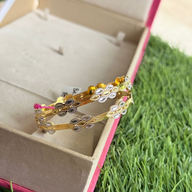 Flora design with gold finish pretty bangle