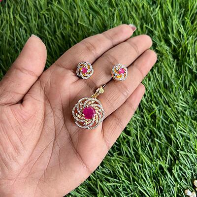 Fancy floral design with stone pendant earning set Fancy floral design with stone pendant earning set