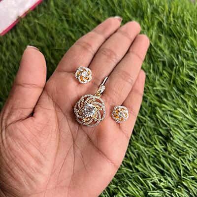 Fancy floral design with stone pendant earning set