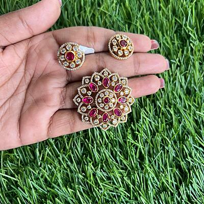 Gold finish floral design Pendant