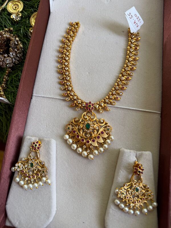Unique floral design with stone neckpiece Unique floral design with stone neckpiece