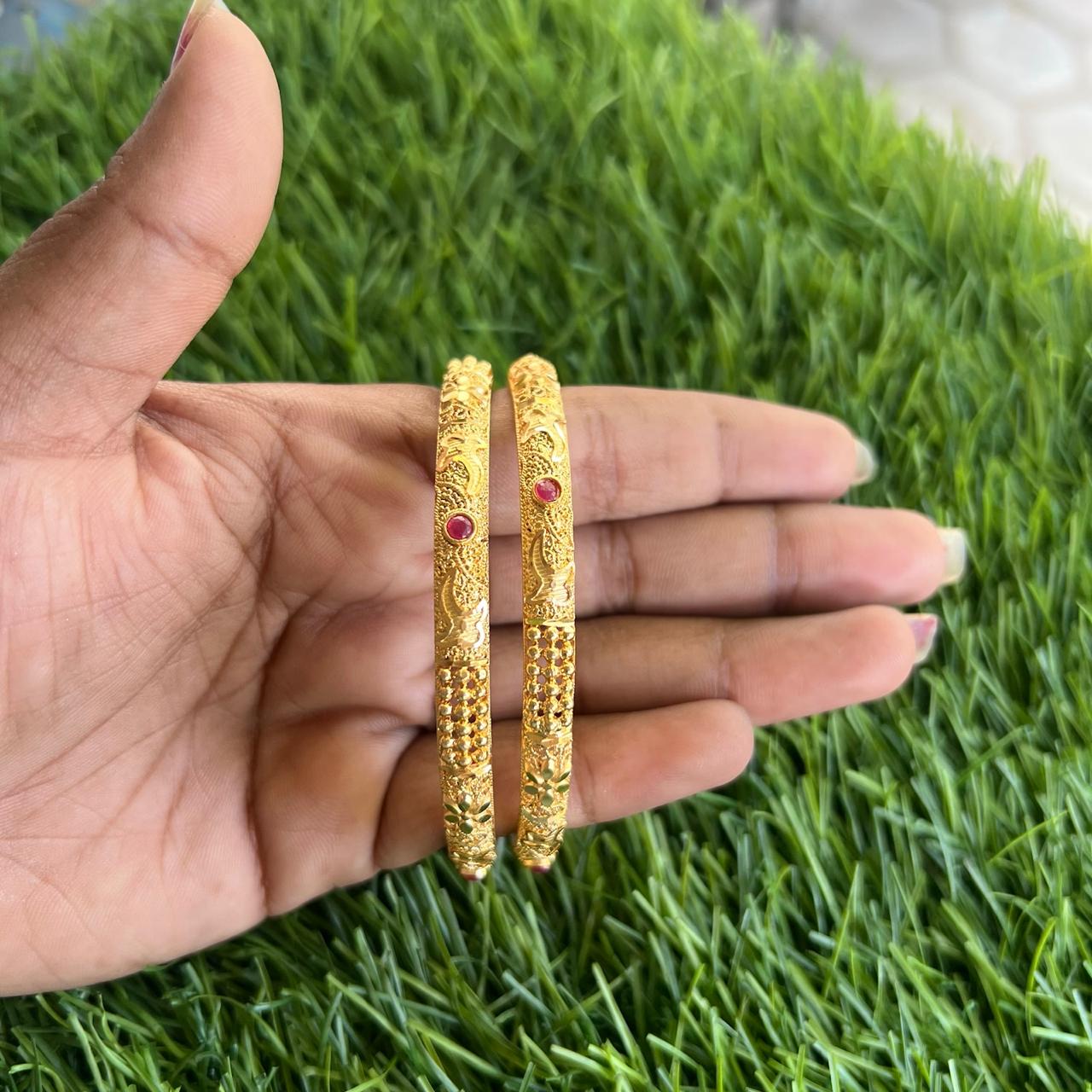 gold finish Oval design Bangles