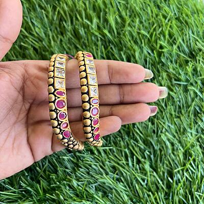 Fancy anitc goldfinish stone and unique design bangle