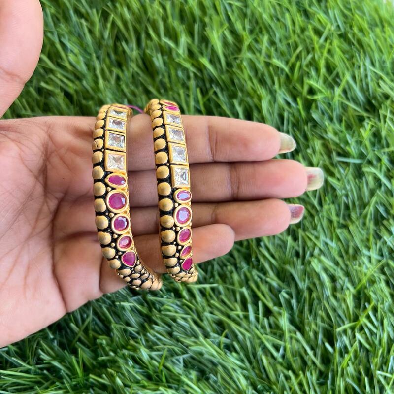 Fancy anitc goldfinish stone and unique design bangle Fancy anitc goldfinish stone and unique design bangle