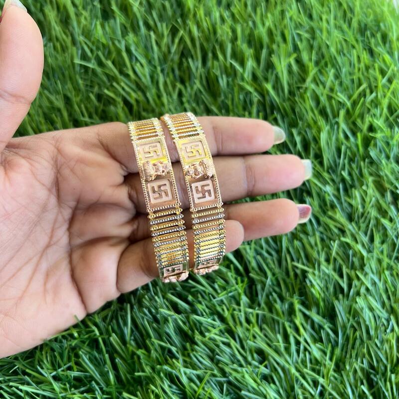 Lakshmi design with straight line gold finish bangle Lakshmi design with straight line gold finish bangle
