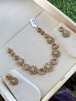 Unique flower design with stone neckpiece Unique flower design with stone neckpiece