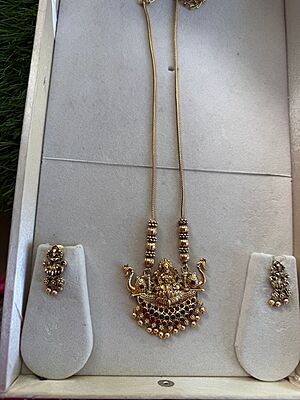 Traditional lakshmi design with unique ball neckpiece