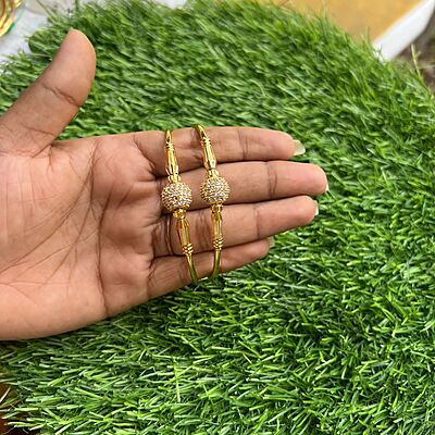 Gold Finish AD Stone Ball Bangle