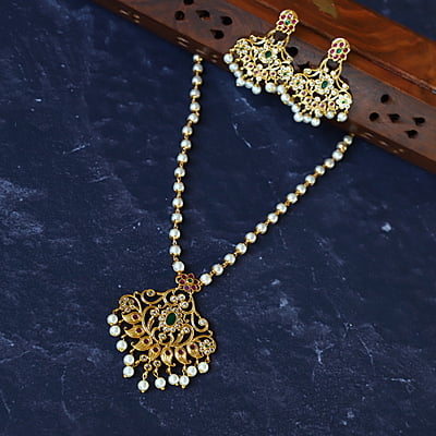 Leaf and CZ Stone Ruby Stone Pendant
