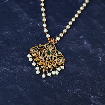 Leaf and CZ Stone Ruby Stone Pendant