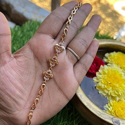 Rose gold bracelt chain type - swan design