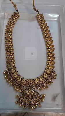 LONG HARAM IN ANTIC FINISH ARE PEACOCK DESIGN