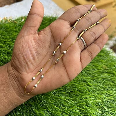 Trendy daily wear gold chain with diamond shaped rodium design