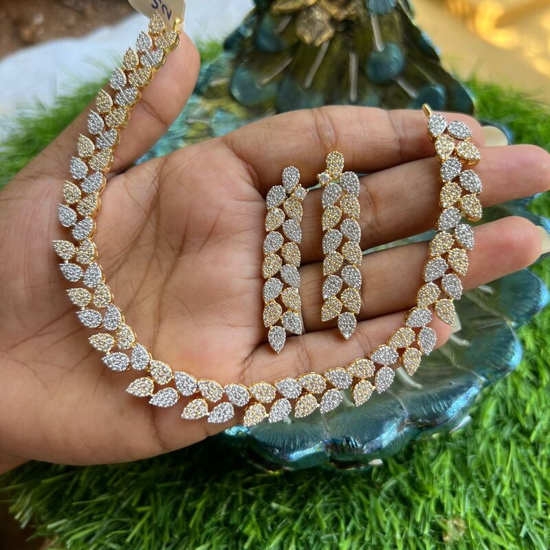 Fancy gold & silver finish AD stone neckpiece -leaf design