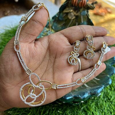 unique design gold finish AD stone neckpiece with earings