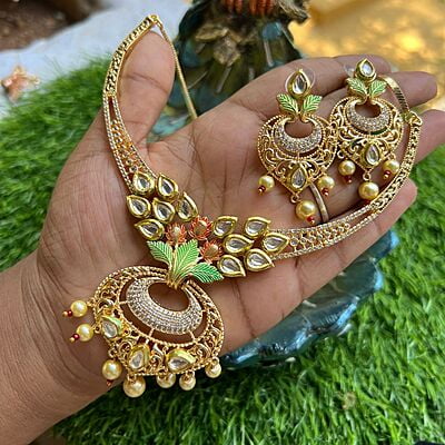 Gold finish AD stone trendydesign neckpiece with earings