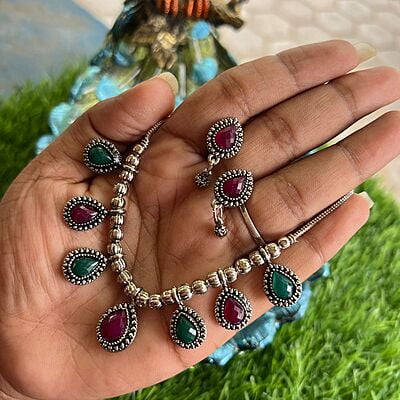 Silver finished chain with ruby stone pendant