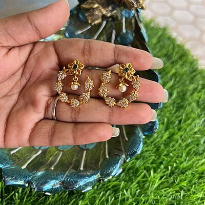 Antic Gold finish AD stone flower design earing