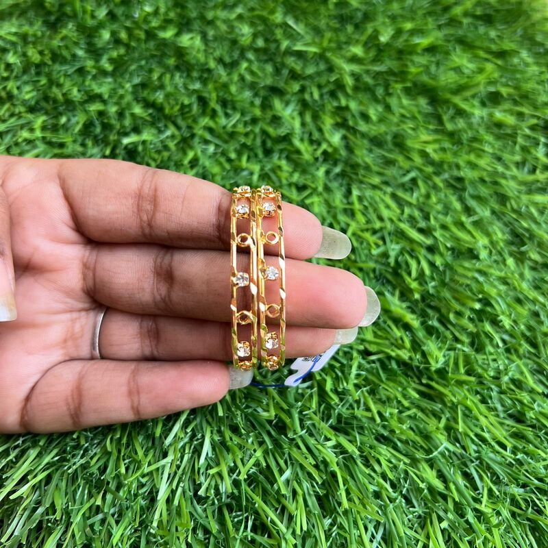 Gold plated circle design with AD stone kids bangle Gold plated circle design with AD stone kids bangle
