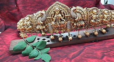 white stone with peacock design hipblet