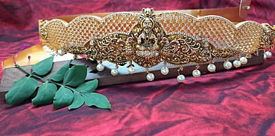 gold with white stone antic hipblet