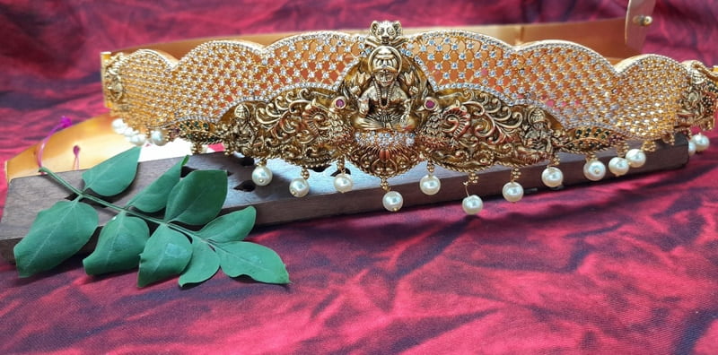 gold with white stone antic hipblet