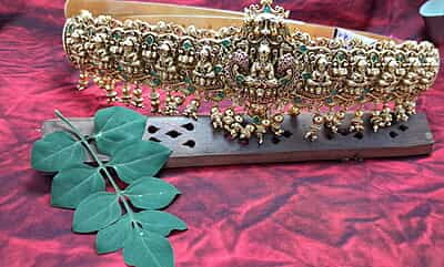 green stone with lakshmi design hipblet