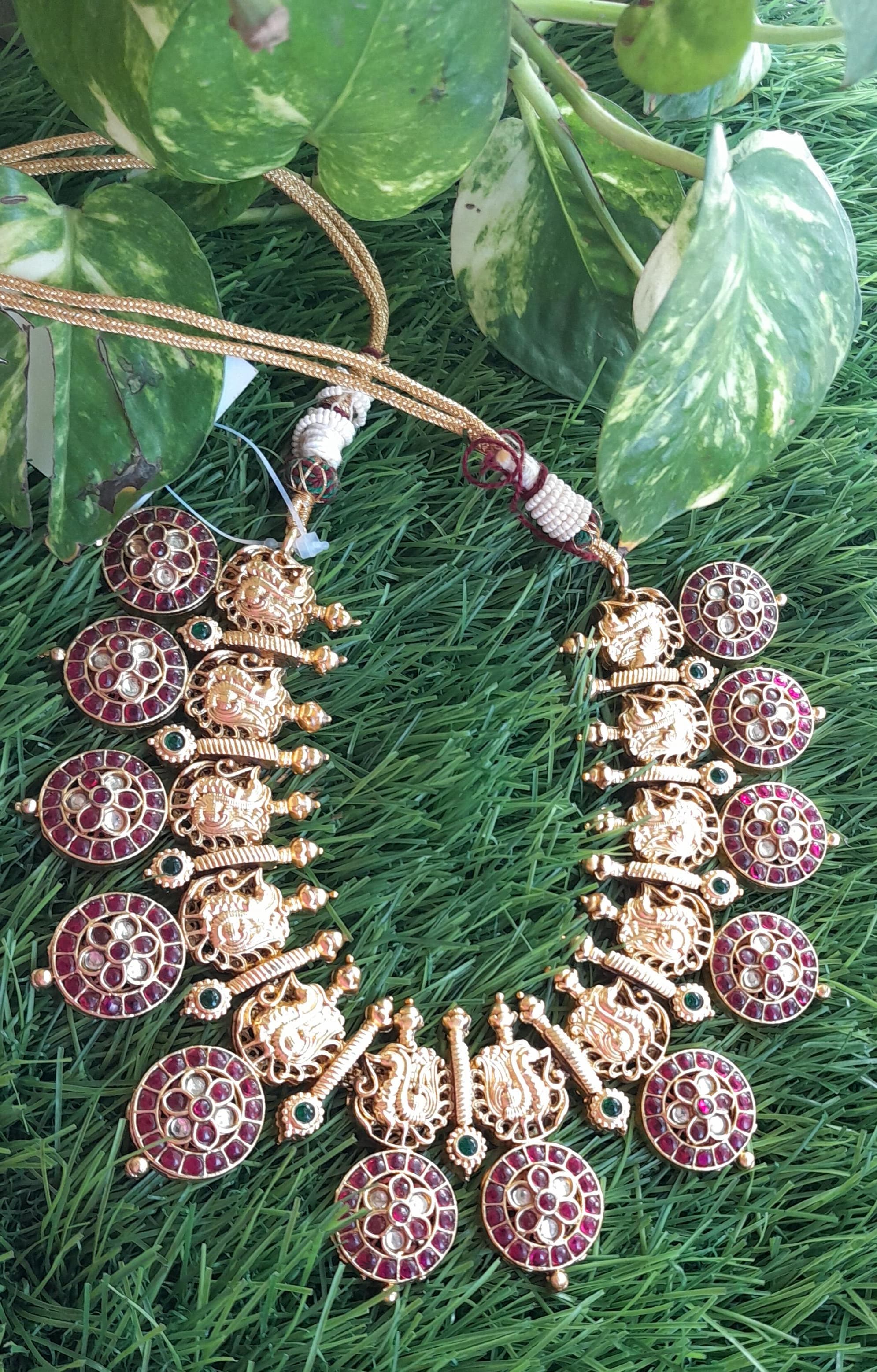 coin based rend stone neck piece