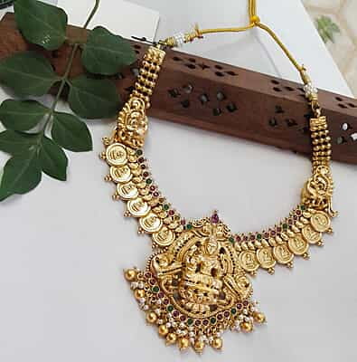 lakshmi with coin red and green neckpiece