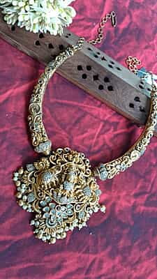 white stone and lakshmi design neckpiece