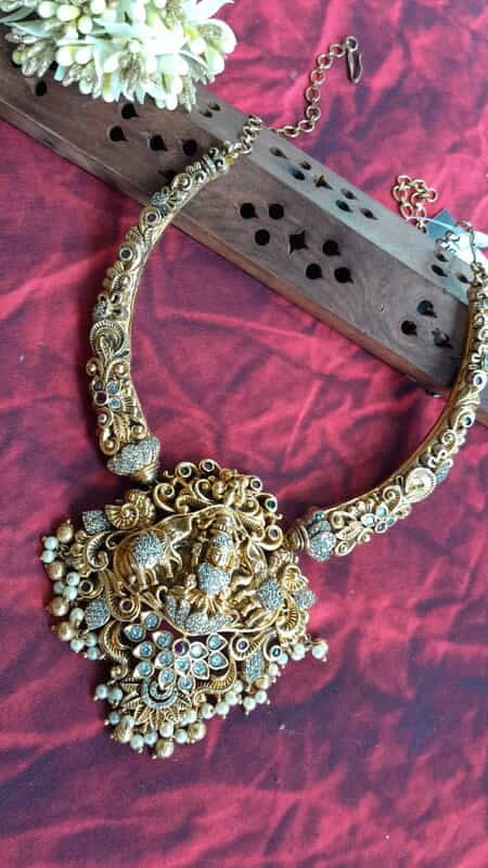 white stone and lakshmi design neckpiece