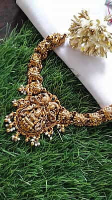 peacock with stone lakshmi neckpiece